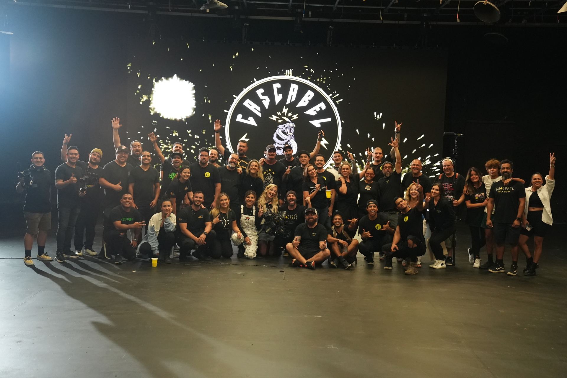 The Cascabel Companies crew together on a sound stage